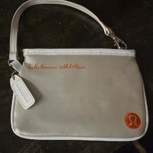 lululemon athletica Beige Wristlet with Orange Logo